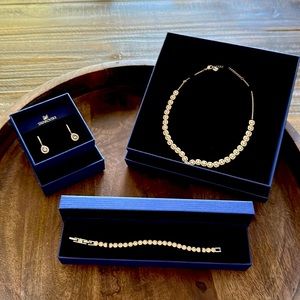 BRAND NEW Swarovski jewelry set. Necklace / Bracelet / Earring $450 or BO